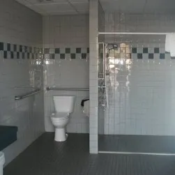 A tiled shower room in the bathhouse